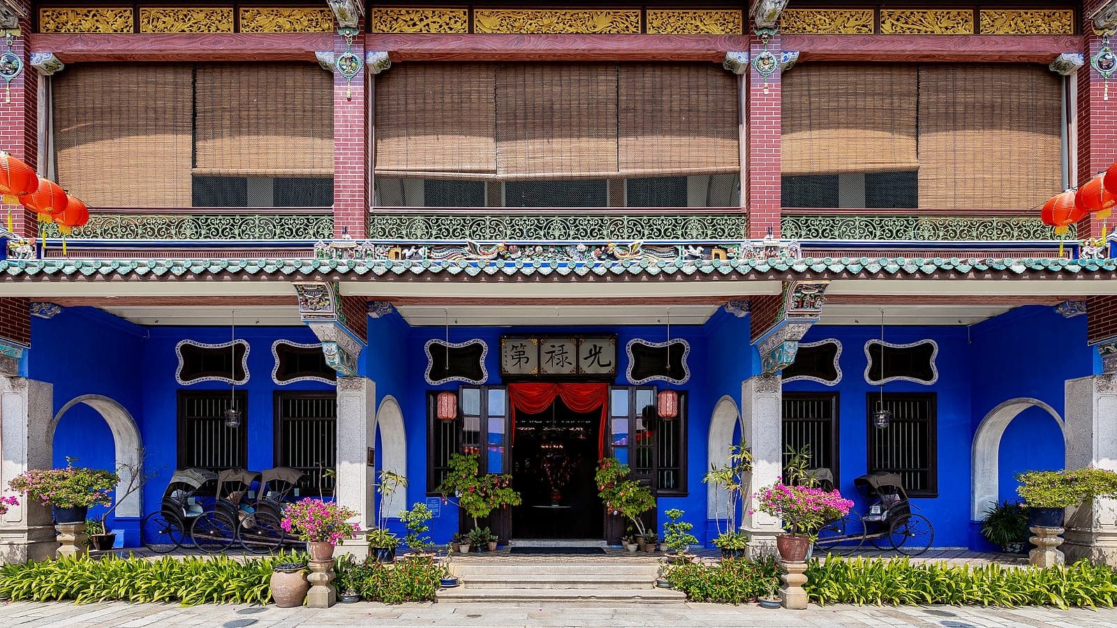 Carved screens and antique fittings inside