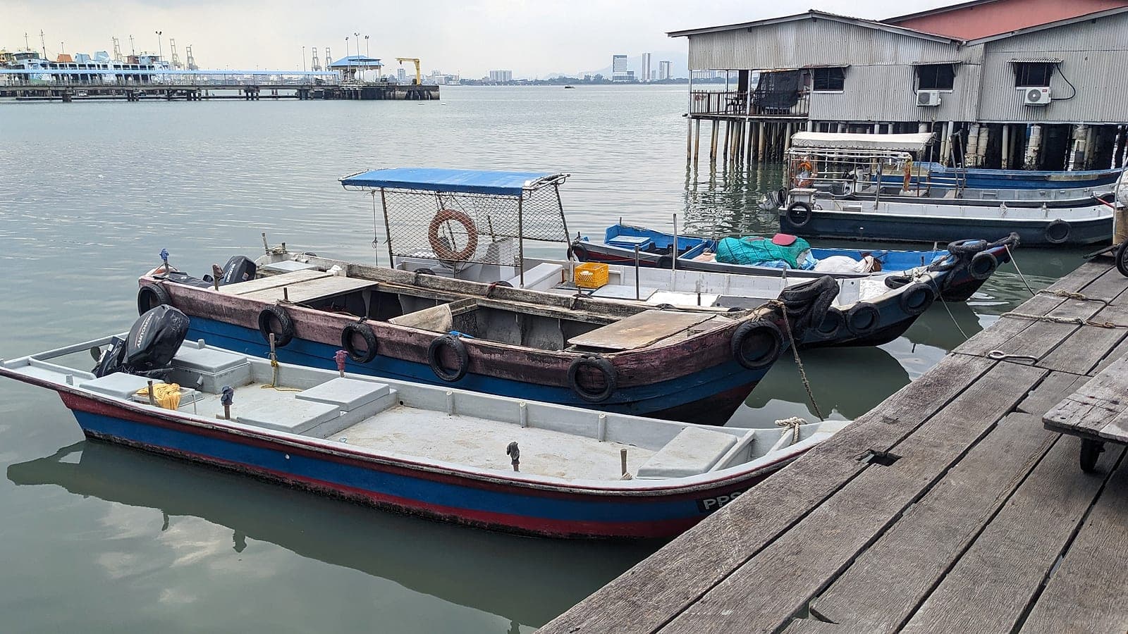 Fishing boats moored beside the jetty
