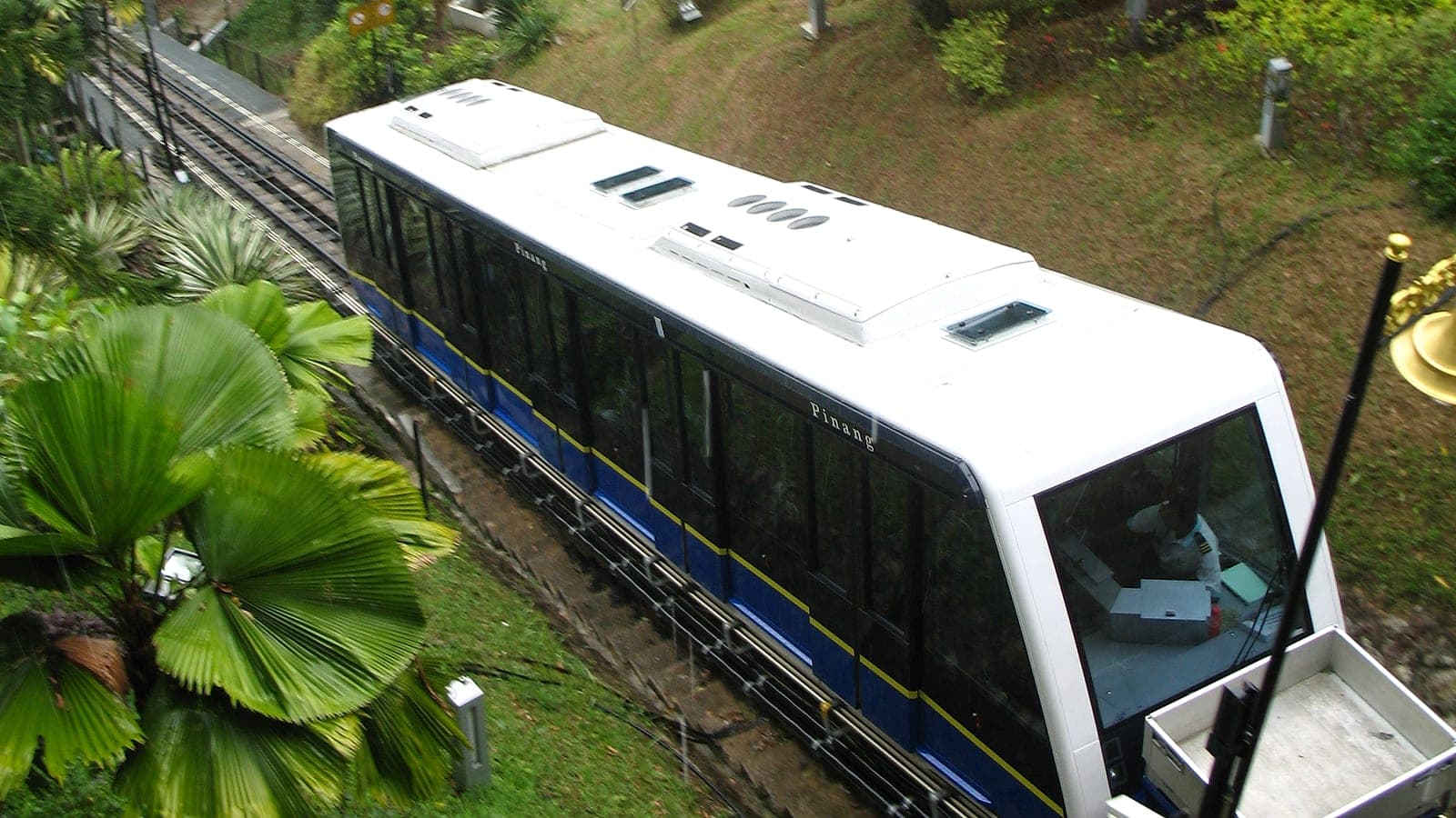 A funicular car waiting at the Penang Hill station