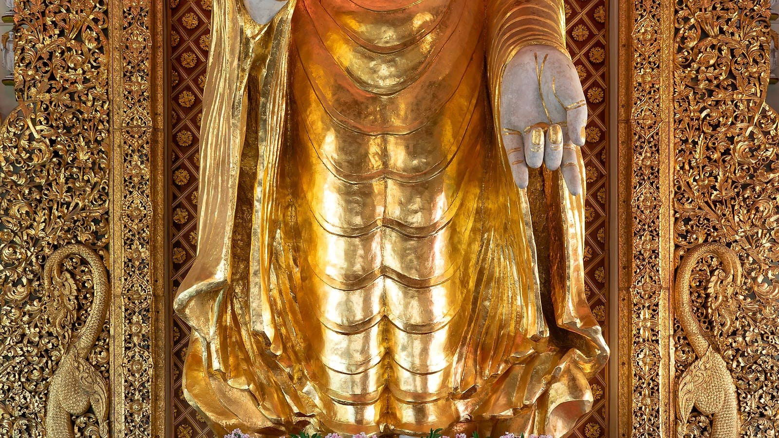 The large standing Buddha statue at the temple